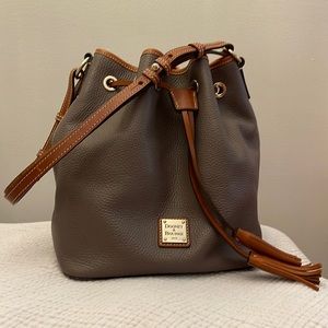 Dooney & Bourke Leather Drawstring with Brown and Gold Accents. EUC!